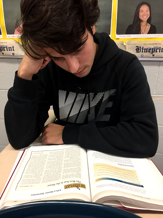 Stressed-student Vince Vena studies for a test.