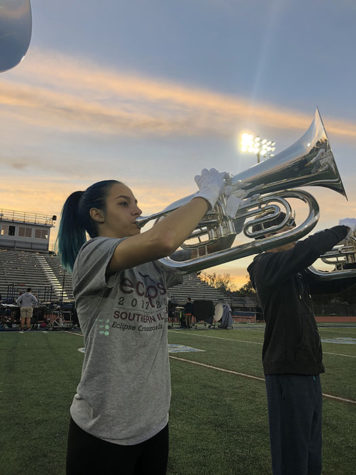 Emma Clemens practices increasing  her sound on baritone in the marching band.