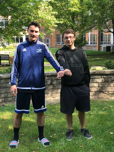 Justin Esposito (right) with his baton-passing partner.