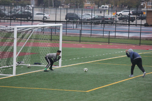 Varsity goalie at practice.