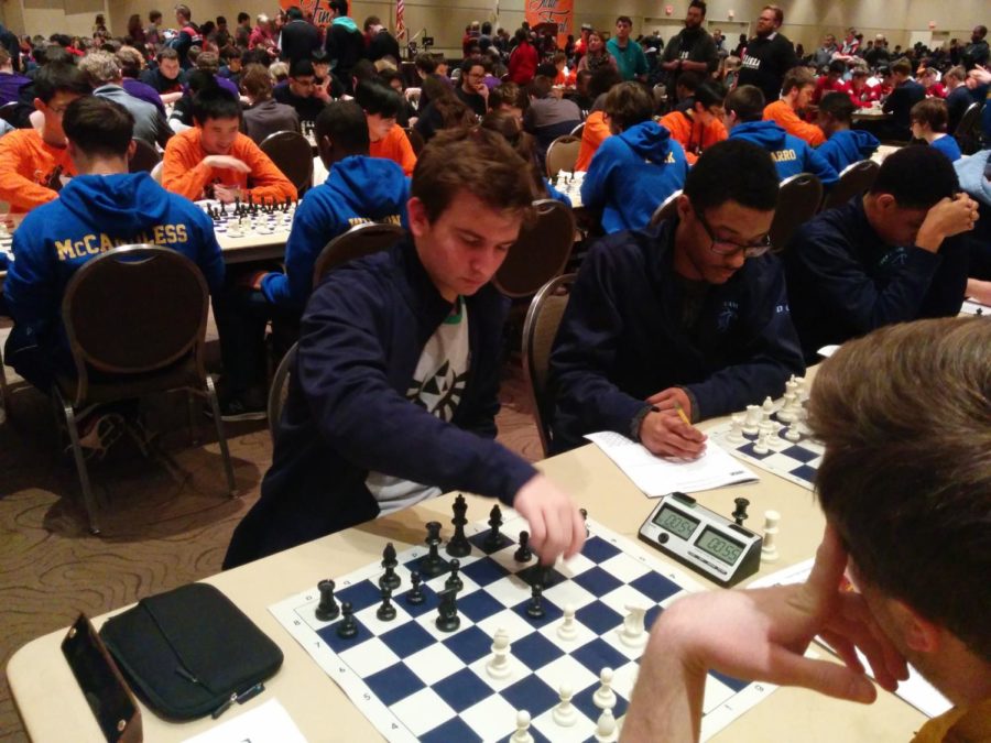 (Right) Junior Johnathon Leatherwood competes at the State Chess Tournament in Peoria, Ill.