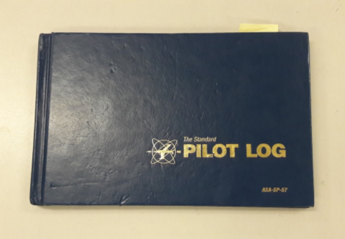 This is known as a Pilot Log book. Similar to the tracking sheet given to students during Drivers Education, pilots use these books to keep track of their flying.