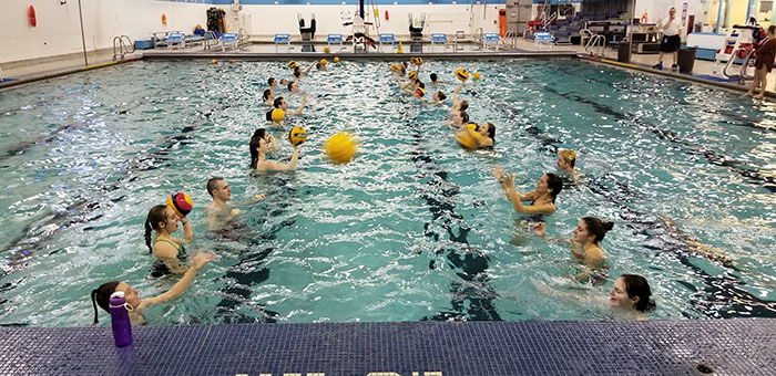The DGS water polo club warming up before a scrimmage.