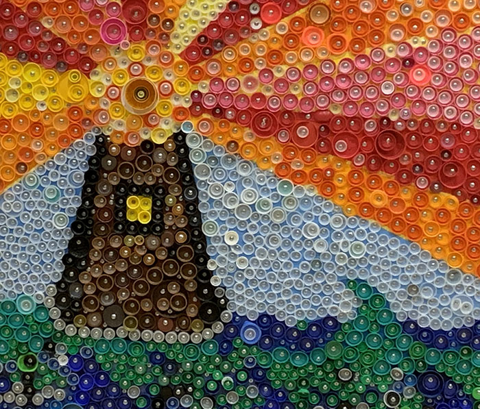 Drawing and painting classes created this lighthouse poster from recycled bottle caps to promote the Erikas Lighthouse campaign and saving the earth.