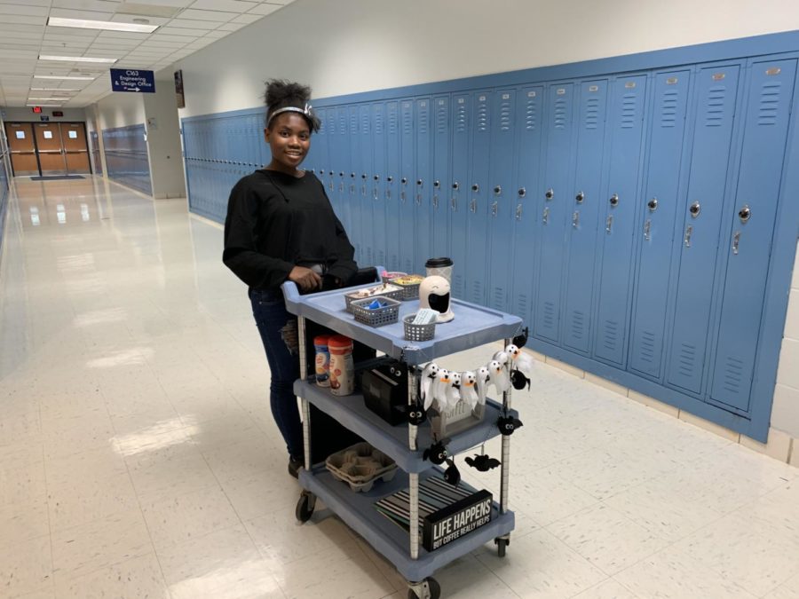 Freshman Jasmine Hawkins enjoys delivering coffee as part of the Mustang Mugs service.