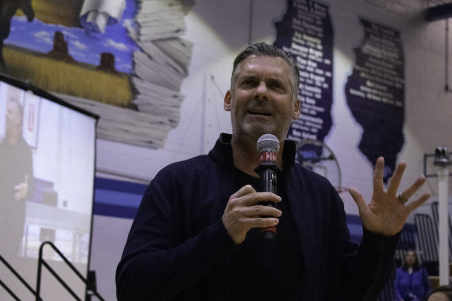 Slowikowski, walks down the center aisle of the gym as he pours his heart out to the students of a lifetime of struggle and gain.