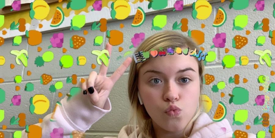One of the self-proclaimed quiz queens (the other being Tatum Mitchell) poses with a fruit Snapchat filter.