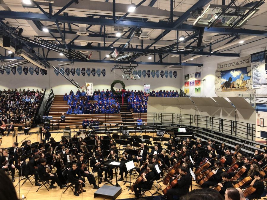 The D99 orchestra and the DGS combined choirs get ready for the start of another holiday assembly.
