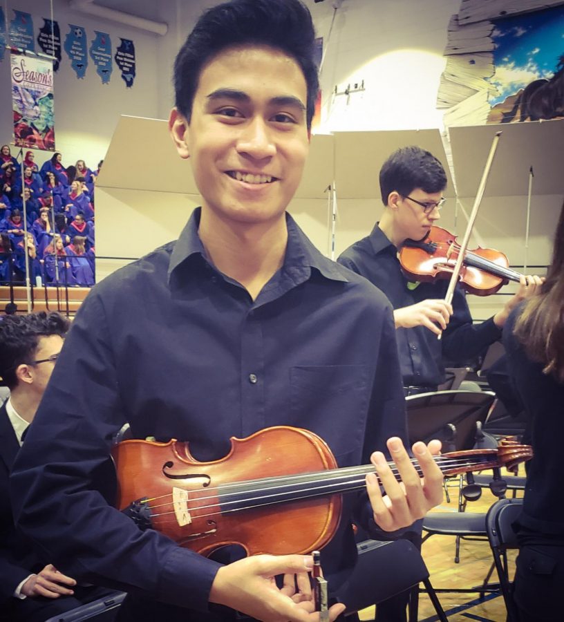 Gomez before he performs at the combined orchestra  holiday concert. 