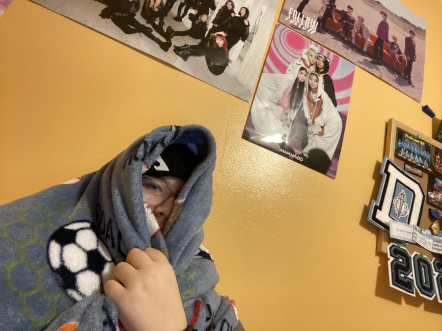 Me, at home, in a blanket, surrounded by K-Pop posters, not giving a care in the world about prom or really anything else.