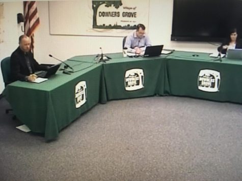 Mayor Robert Barnett is preparing to start the council meeting.