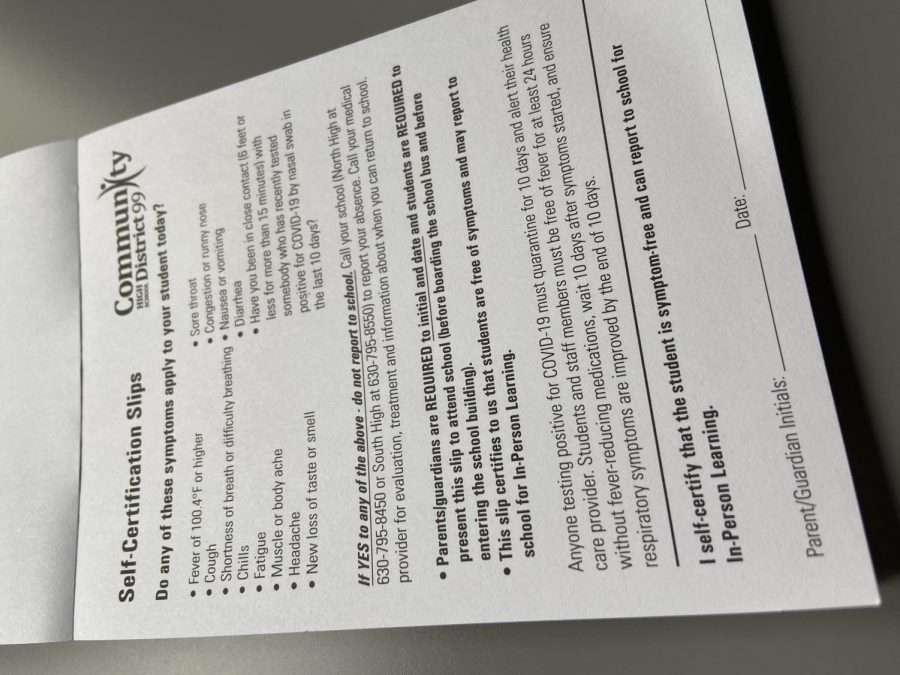 When students enter the building, they give this self certification slip to a security guard verifying they dont have COVID-19 symptoms. 