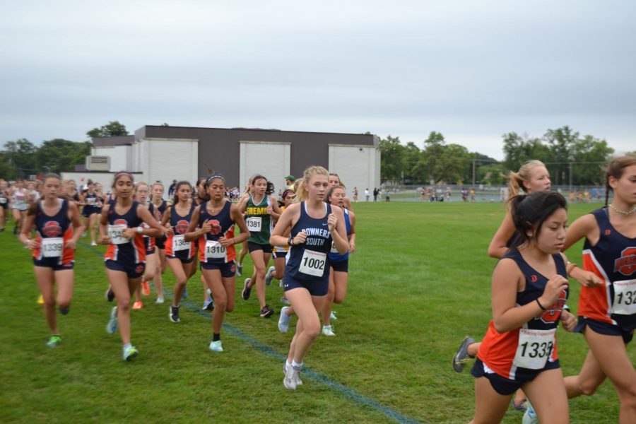 Freshman Lilliana Jaeger pulls away from a pack of Oak Park River Forest runners just past the mile and a half mark.
