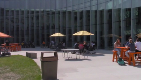 The new outdoor seating has tables with umbrellas and high-top bench options.