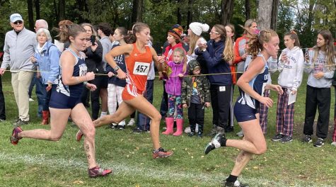 Madi Sisson and Nora Joy finish their race strong.