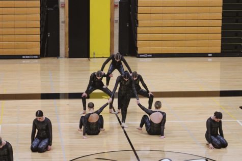 The Pintos hold their opening pose at the conference championship. They won the West Suburban Conference Championship with a performance of their jazz routine to ‘Bottom of the River’ by Delta Rae.