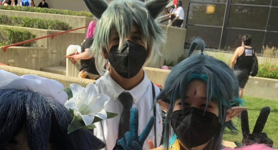 DGS Freshman Sebastian Blanco, poses with their friends outside a cosplay convention. 