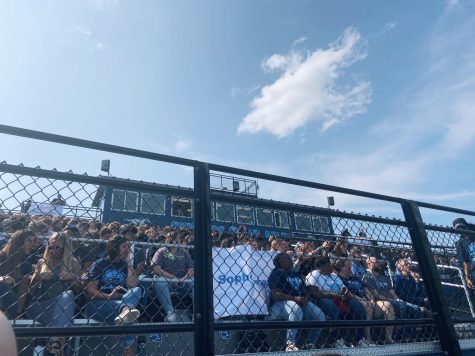 Students pack the football stadium bleachers to watch the 2022 pep assembly. The assembly incorporates a variety of acts, including performances from the DGS cheerleaders, Fillies and solo singers. 