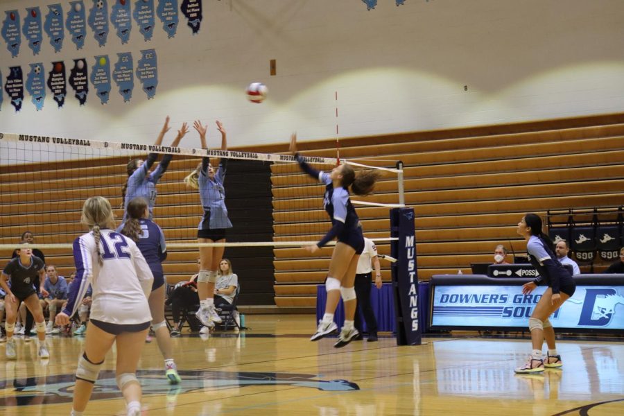 Junior Addy Bryant gets a kill, scoring a point for the mustangs.