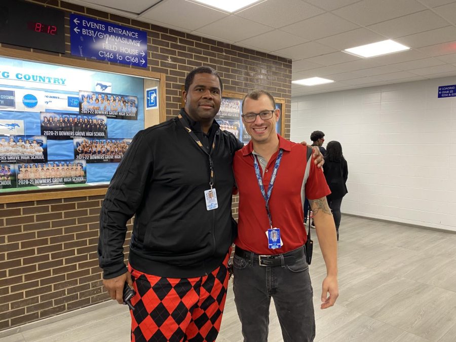 Associate Principle Omar Davis and Supervisor Michael Reyes are a red and black team for spirit day.