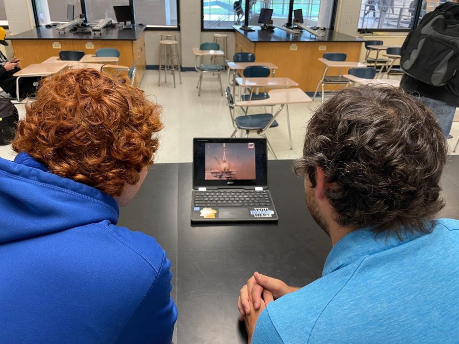 Sobczak and Lyons watching Laliberté take off in the Soyuz TMA-16 spacecraft.