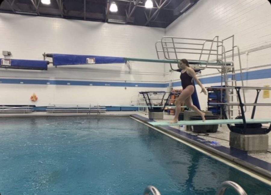 Parson approaches the tip of the board to practice her dive for the upcoming meet.

