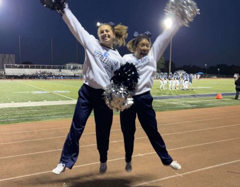 Haley Fredricks and her teammate jump with joy at the DGS vs Addison Trail Game 