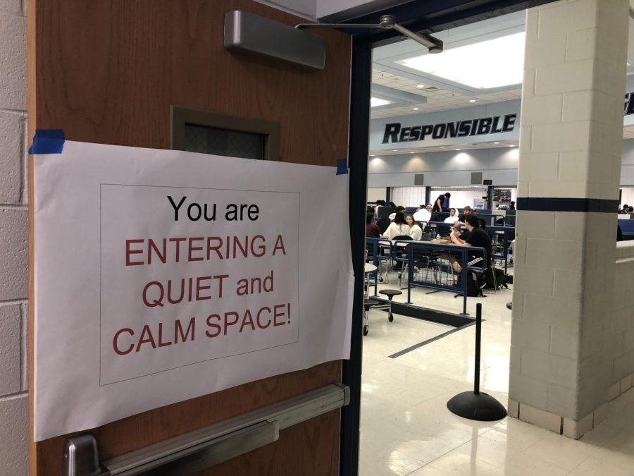 The entrance to the cafetorium is decorated with signs meant to remind students that it is meant to be a quiet space. 