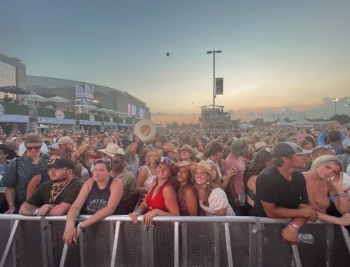 Vincent and her freinds enjoy front row spots at the concert.