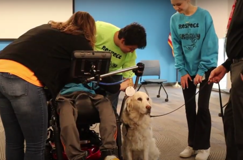 During their resource periods, students were able to come in groups of three or four to spend time with one of a few therapy dogs in the Community room. 