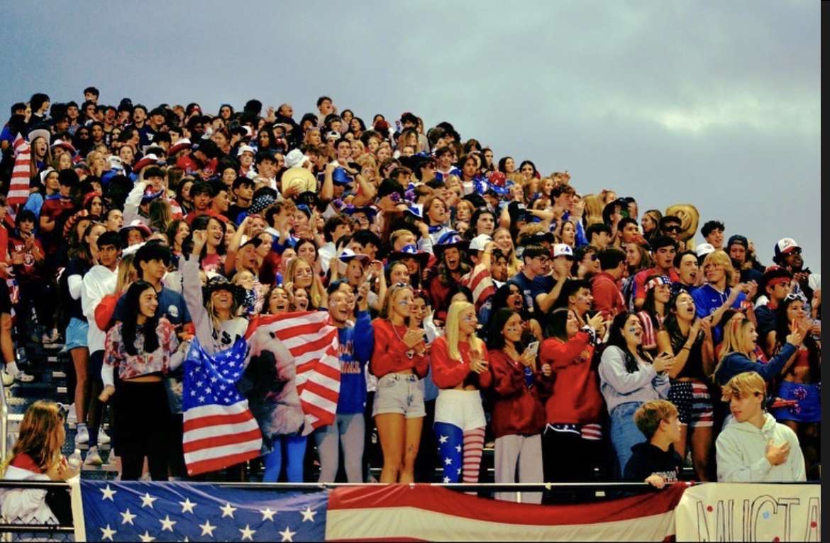 DGS students supporting the football team by all wearing USA gear for the theme.