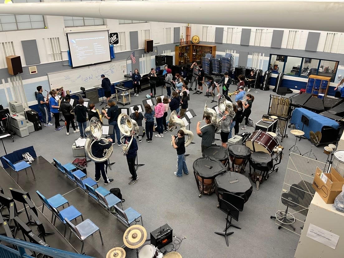Marching band also practices their music inside the band room before they take it out to the field for performances working hard to memorize the material.