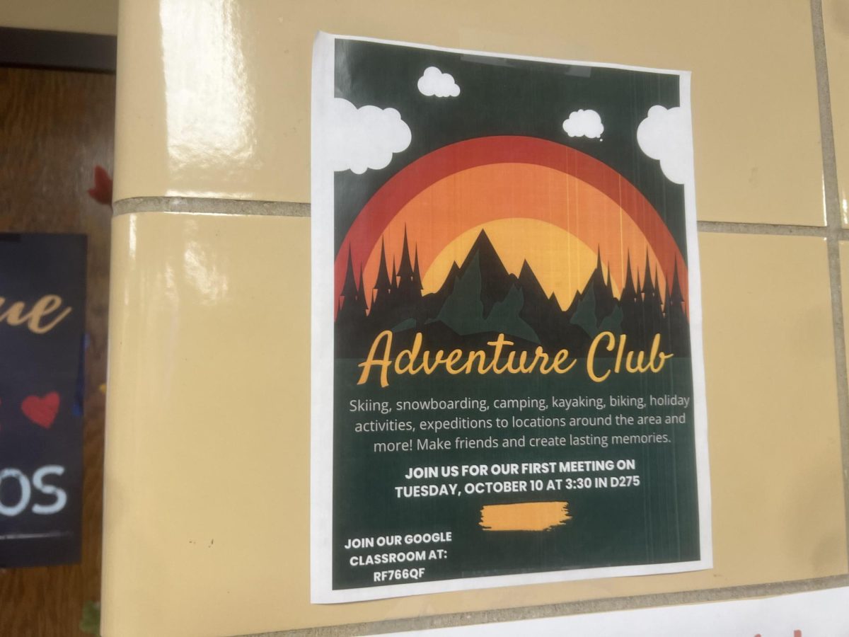 An+Adventure+Club+poster+hangs+in+the+hallway%2C+advertising+the+new+club.