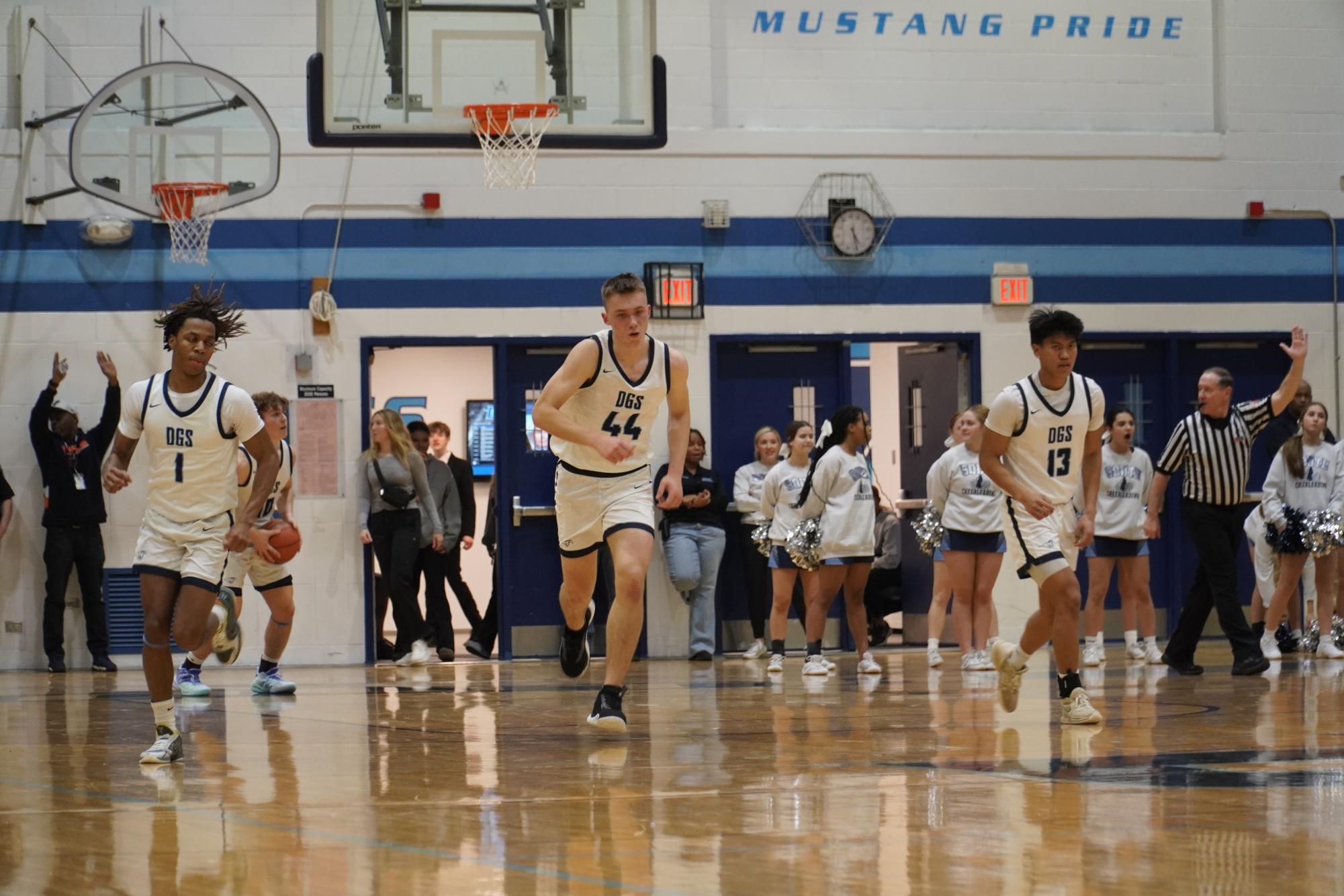 DGS Varsity Basketball Team Falls Short Against Proviso East Pirates with a 66-64 Score