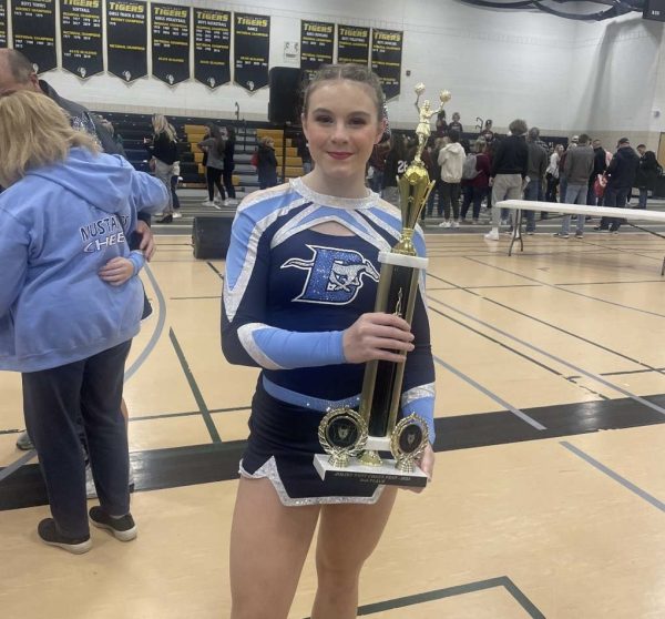 Teah Stephenson poses with the second place trophy after the Joliet West Competition. 