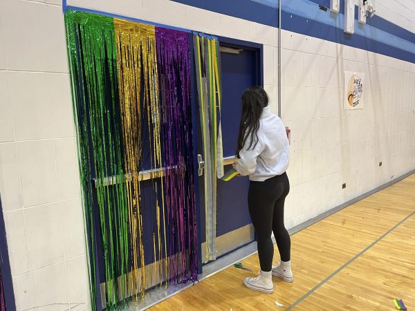 Kelliher runs the winter dance setup, which includes decorating and preparing the gym for the event. 