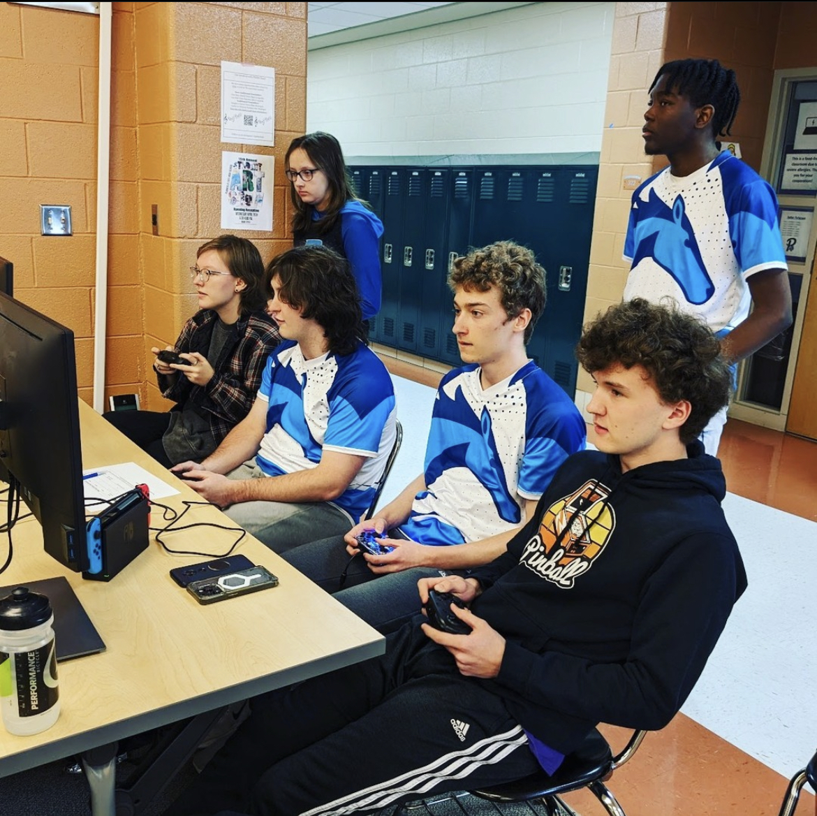 Meliukstis (first row, second to the right) plays for the Mario Kart team at sectionals, placing fourth.