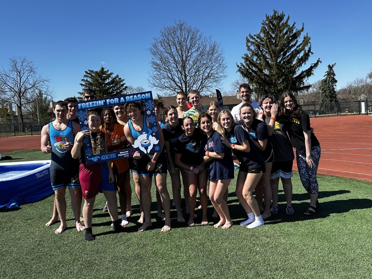 Students came together to support Special Olympics by jumping in the icy water.