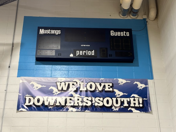 The large gym scoreboard at DGS.