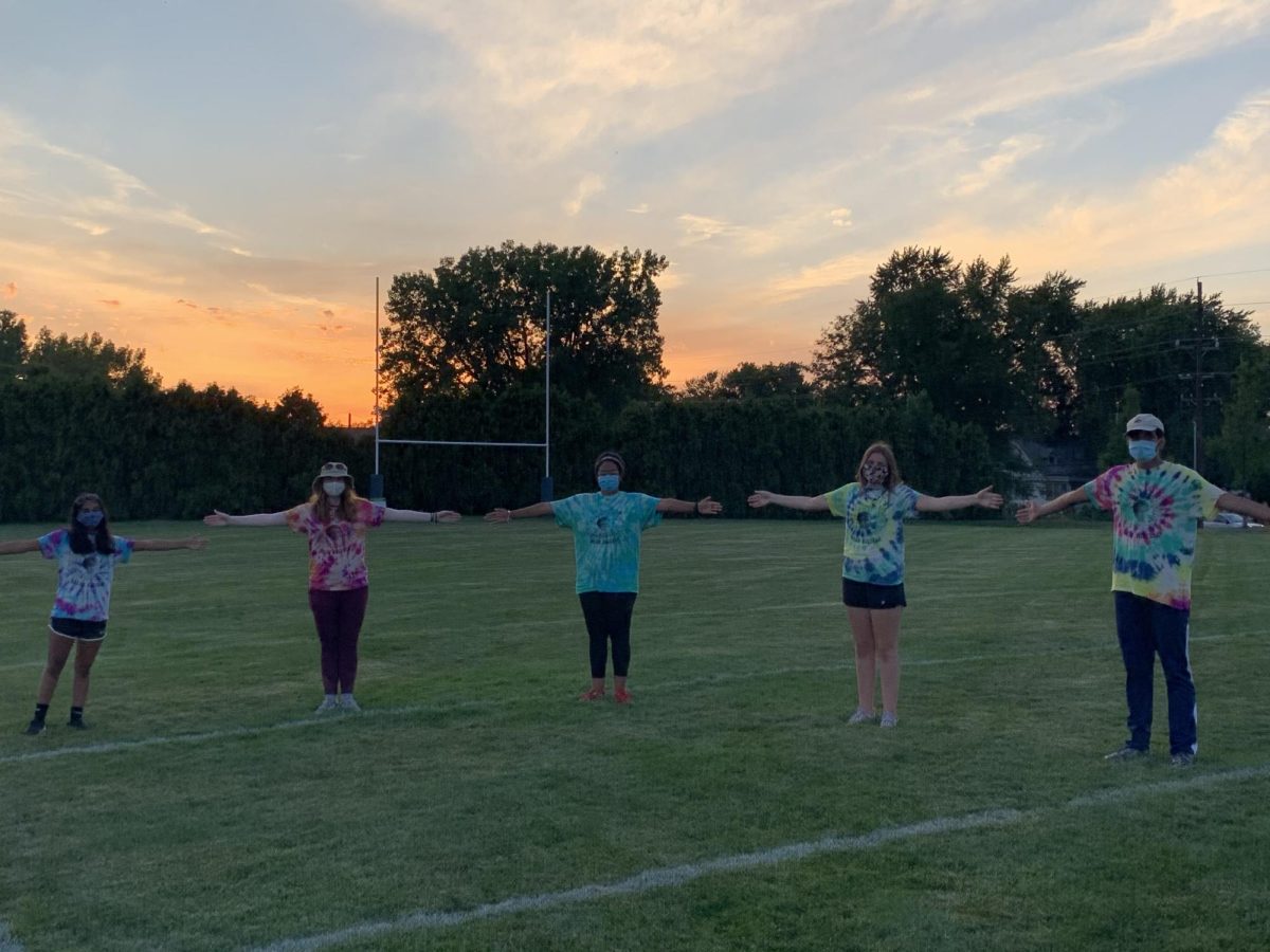 Zeigler and her friends warm up for a Marching Band practice session at sunset during her sophomore year.