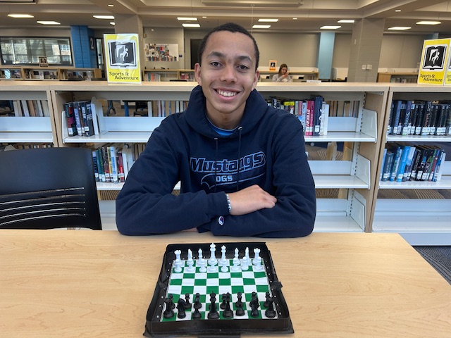 When not practicing online, Robinson uses a travel chess board. 