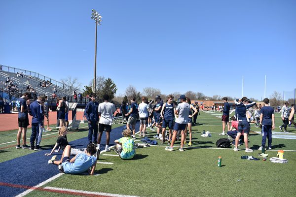 The Downers Grove South boys track team competed in the annual home Bud Mohns and Bob Cohoon Invite on April 20, honoring the two past coaches and teachers at DGS.
