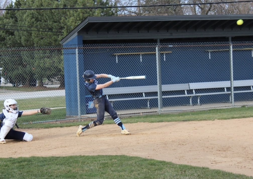 Senior+softball+player+Grace+Taylor+hitting+the+ball+during+a+practice+scrimmage+game+at+DGS.