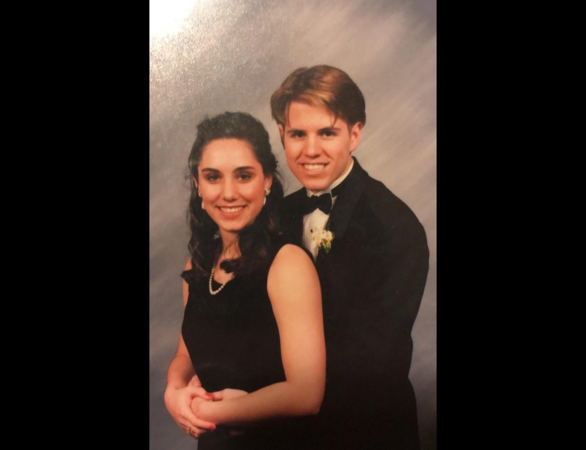 Maloney poses with his girlfriend kelly during a dance.