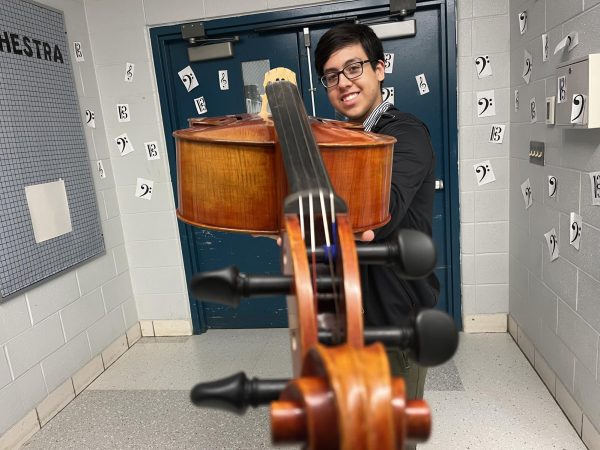 Senior Kevin Hernandez finds harmony in every note as he plays his cello.
