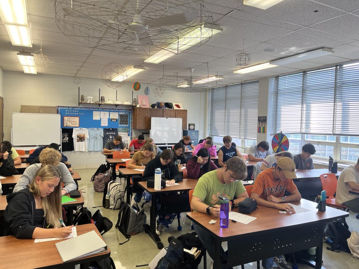 Calculus BC students study in a nearly-filled room; even specialized classes like this are experiencing an overflow of students. 