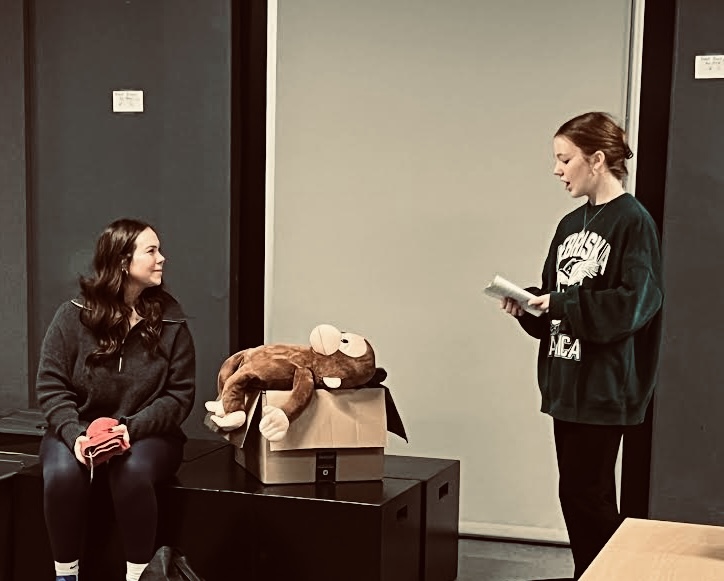 Juniors Abby Heavrin and Carly Bleau get into character before jumping into theater rehearsal.