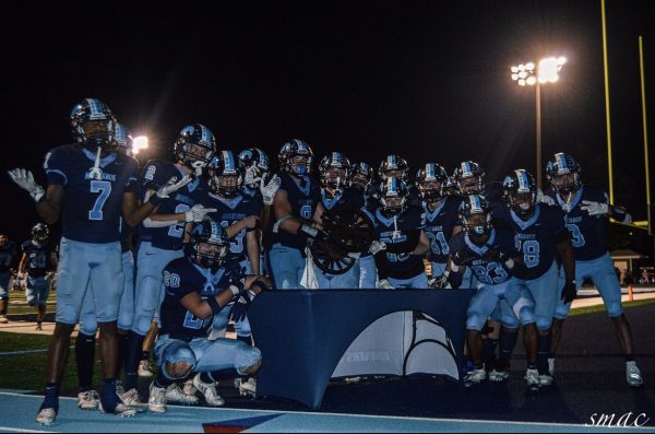  Downers Grove South Mustangs celebrate after a big 31-28 win vs rivals Hinsdale South.