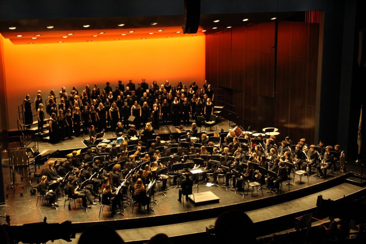 Wind Ensemble and the Choirs prepare to perform of act 2 of the 'dimensions' concert.