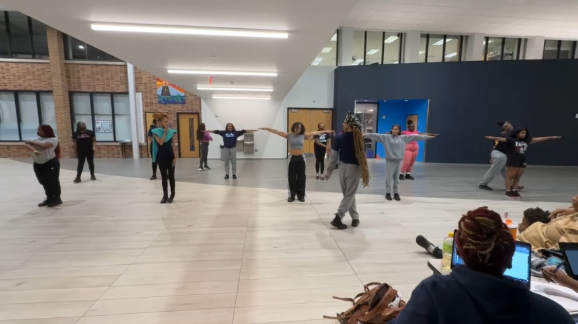 The DGS  Steppers practicing in the C-wing hallway.